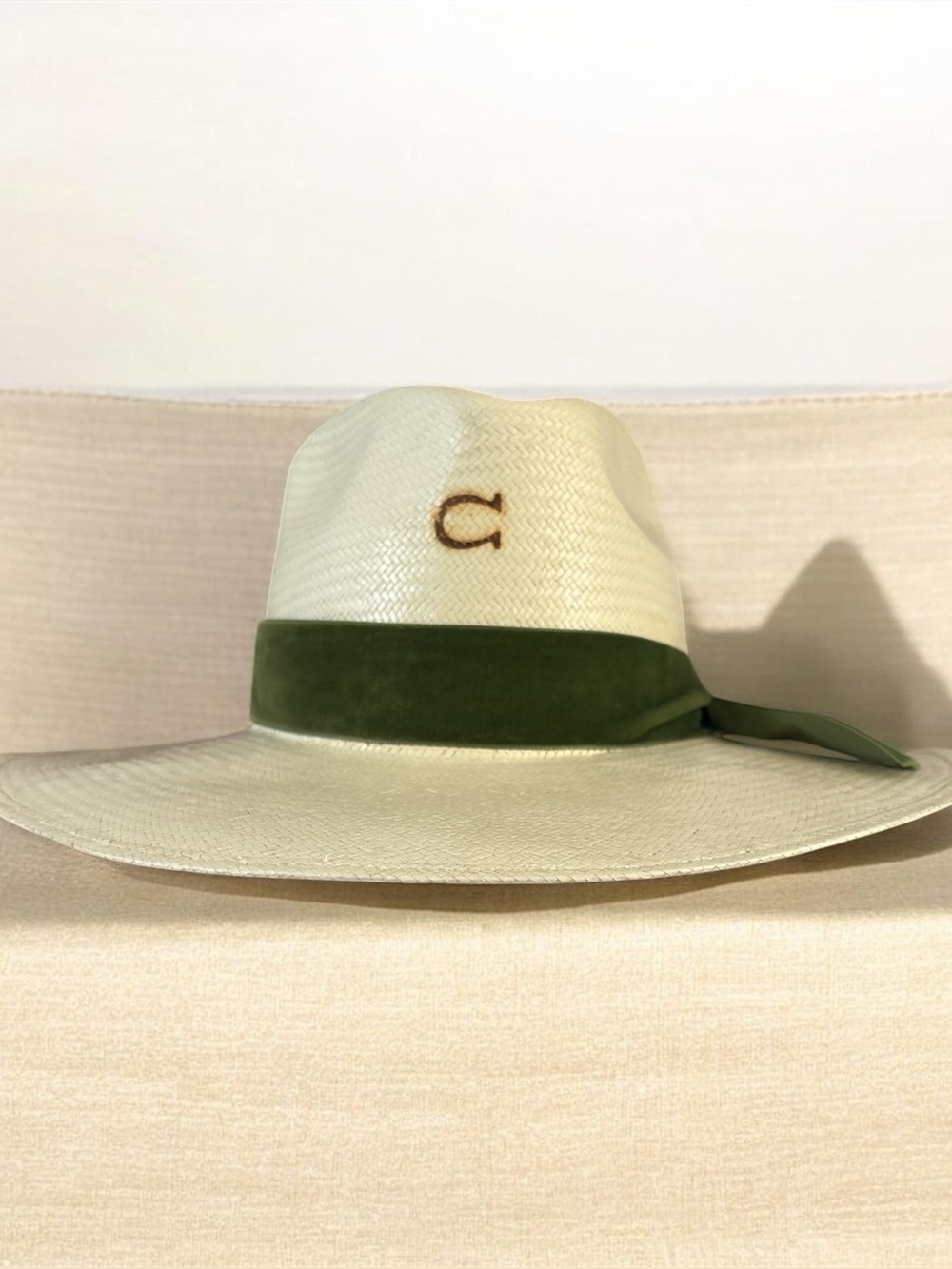 Wide Brim Straw Fedora with Olive Green Band.
Charlie 1 horse.